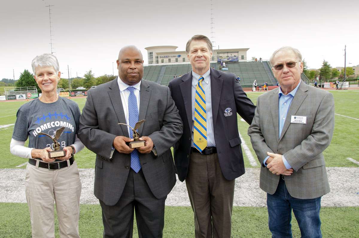 2018 Alumni Award recipients Dr. Kathy Keown and Curtis Clemons with Shorter University President Dr. Don Dowless and the Alumni Association Board President Darrell Black