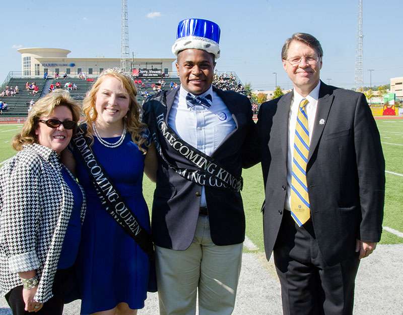 Dr. and Mrs. Dowless with the Homecoming King and Queen.