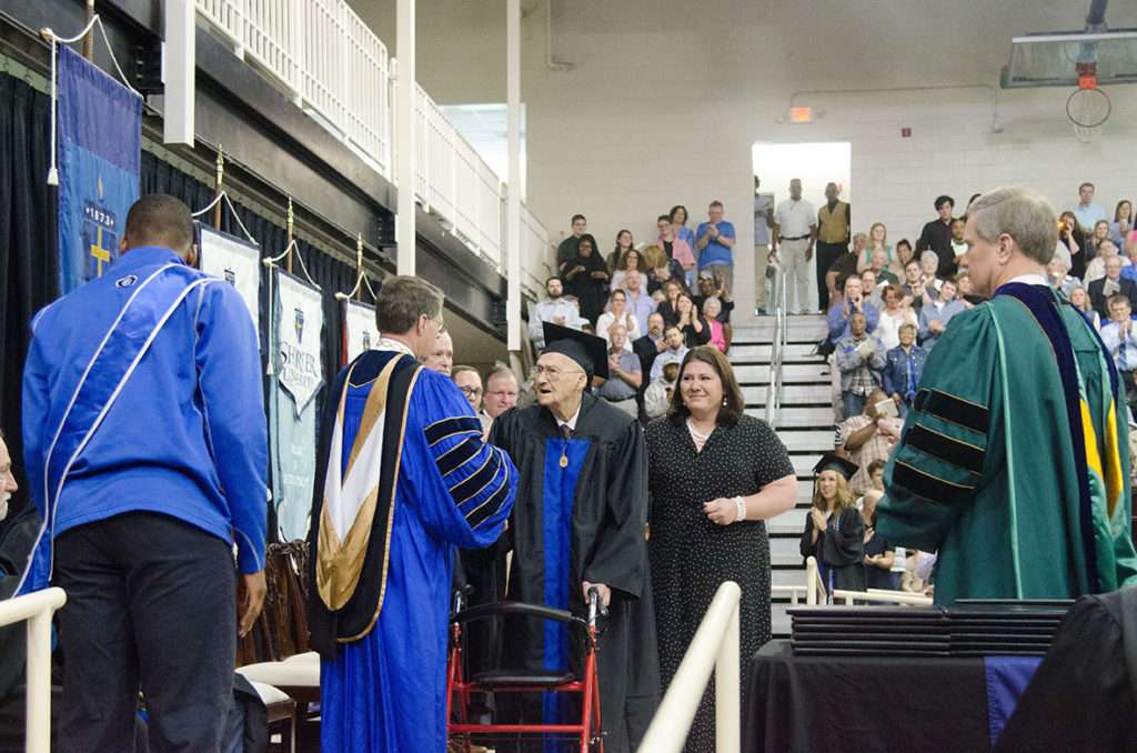 Rev. Horace Sheffield accepting his diploma from Shorter University President Dr. Don Dowless. 