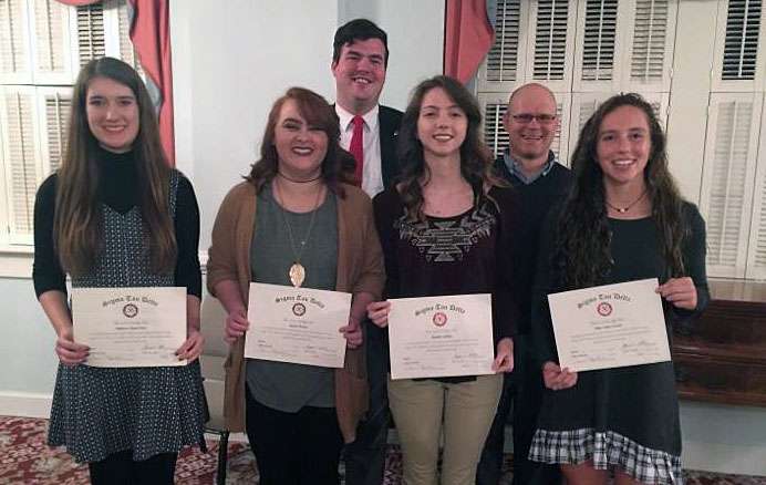 Honorees with their certificates.