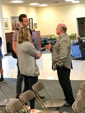 Steve Plunkett speaks to students at Shorter. 