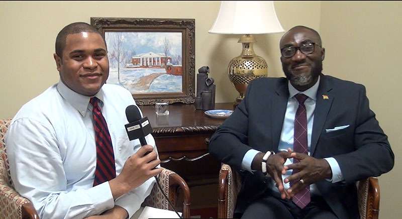 Public Relations intern Caleb Britt interviews Dr. Yaw Adoo.
